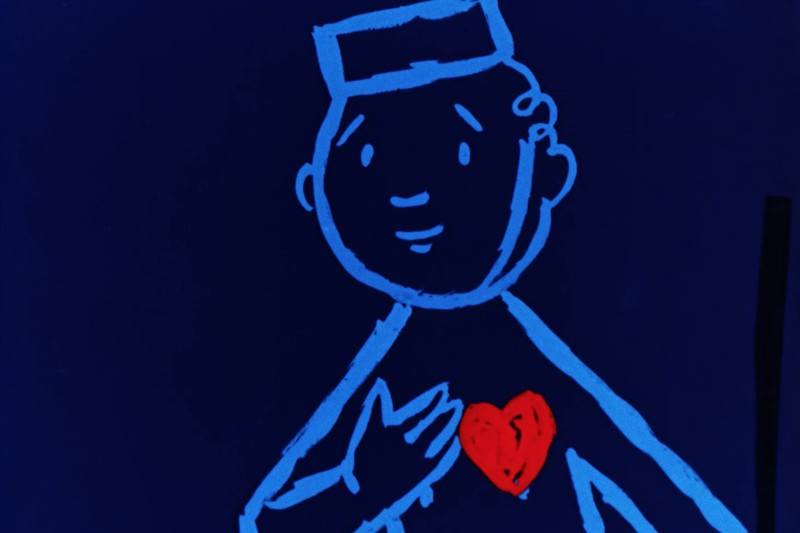 Prosty niebieski rysunek przedstawiający osobę z jedną ręką na piersi i czerwonym symbolem serca na piersi, umieszczony na ciemnoniebieskim tle.