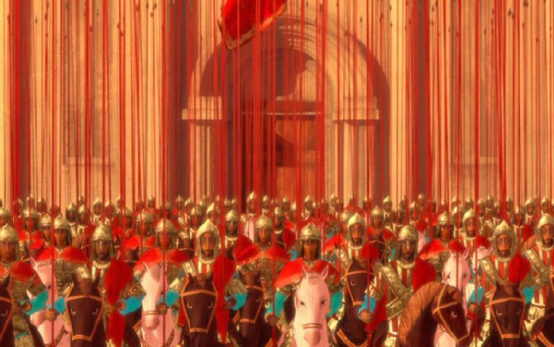 Duża grupa rycerzy w zbrojach na koniach, ubranych w czerwone peleryny i złote hełmy, stoi w szyku przed okazałym budynkiem, nad którym wiszą wysokie czerwone sztandary.