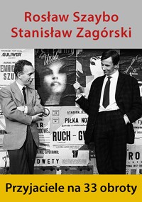 Dwóch mężczyzn stoi i rozmawia przed ścianą pokrytą starymi plakatami. Tekst powyżej brzmi Rosław Szaybo Stanisław Zagórski, a poniżej Przyjaciele na 33 obroty na żółtym tle.