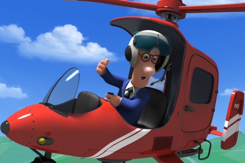 Animowana postać w okularach i kasku pokazuje kciuk do góry, siedząc w kokpicie czerwonego żyrokoptera lecącego na tle błękitnego nieba z kilkoma chmurami.