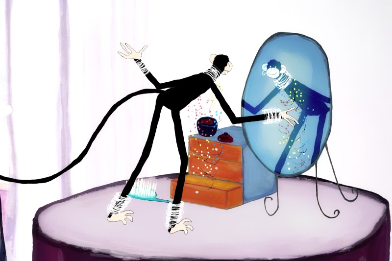 Kreskówkowa małpa stoi na okrągłym stole, sięgając w stronę owalnego lustra. Małpa jest otoczona kolorowymi kropkami i ma szczoteczkę do zębów, grzebień i małe pojemniki na stole. Jej odbicie naśladuje jej pozę.