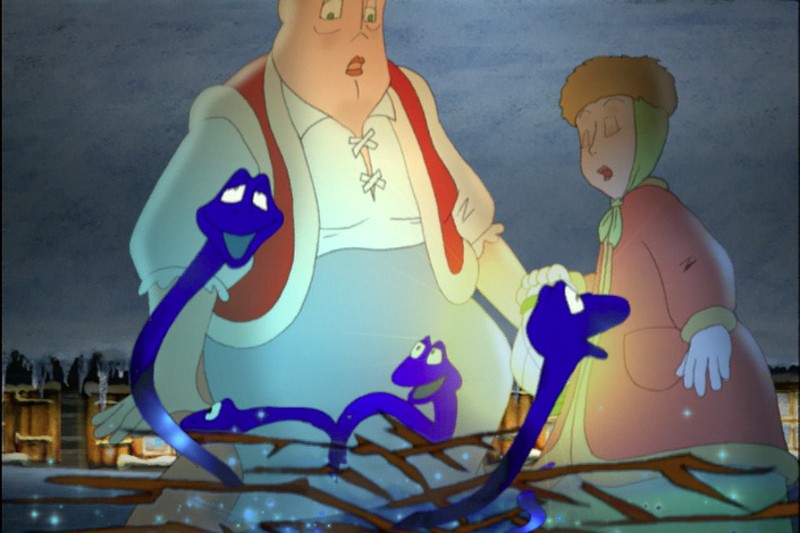 Dwie animowane postacie ludzkie, jedna duża, a druga mniejsza, ubrana w zimowe ubranie, wyglądają na zaskoczone, gdy trzy uśmiechnięte niebieskie stworzenia przypominające węże wyłaniają się z rozbitej drewnianej powierzchni w śnieżnym otoczeniu.