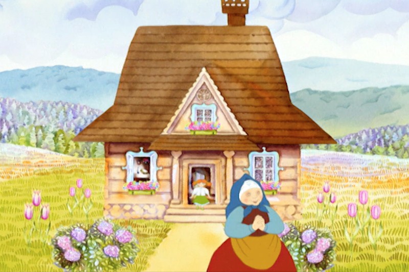 Przytulny domek ze stromym brązowym dachem stoi na ukwieconym polu. Starsza kobieta w chustce stoi przed nim, a dwójka dzieci wychyla się zza drzwi. Kolorowe kwiaty i odległe wzgórza wypełniają tło.