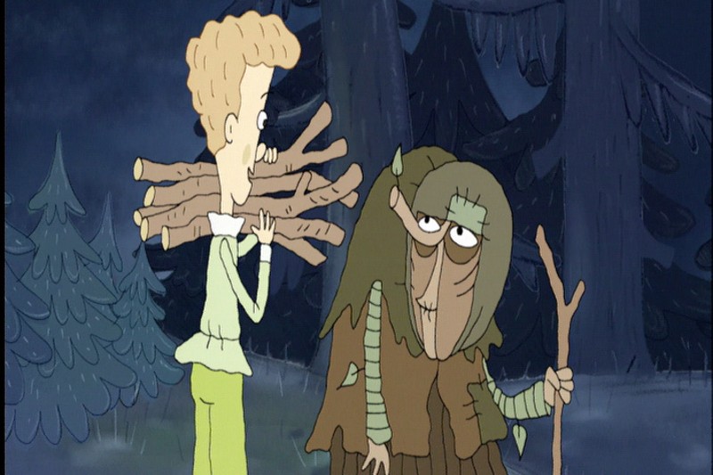 Postać z kreskówki o blond włosach niesie drewno na opał i staje twarzą w twarz z obdartą, zakapturzoną postacią trzymającą laskę w ciemnym, niesamowitym lesie.