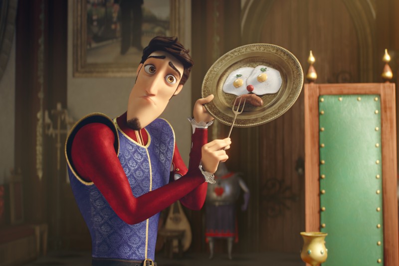 Ożywiony mężczyzna w średniowiecznym stroju trzyma talerz z jedzeniem ułożonym tak, aby wyglądało jak smutna twarz. Patrzy na talerz z zaniepokojonym wyrazem twarzy w wielkim pokoju z zielonym krzesłem w tle.