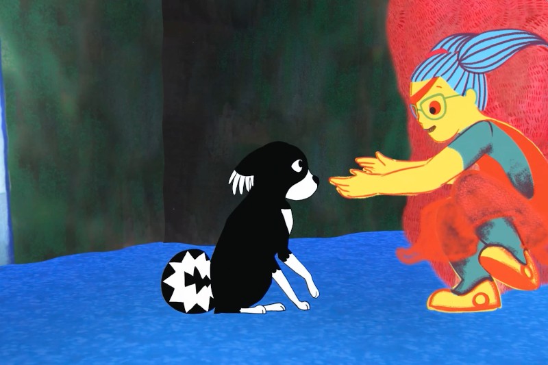 Kolorowa animowana scena przedstawia stylizowaną postać o niebieskich włosach i żółtych okularach, która wyciąga ręce w stronę czarno-białego psa siedzącego na niebieskiej powierzchni, za nią znajduje się ciemne tło.