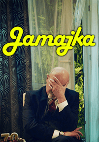 Łysy mężczyzna w garniturze siedzi w środku, z ręką zakrywającą twarz z frustracji. Za nim jest otwarte okno z zielonymi liśćmi na zewnątrz. Na górze widnieje słowo Jamajka w pogrubionej żółtej czcionce.